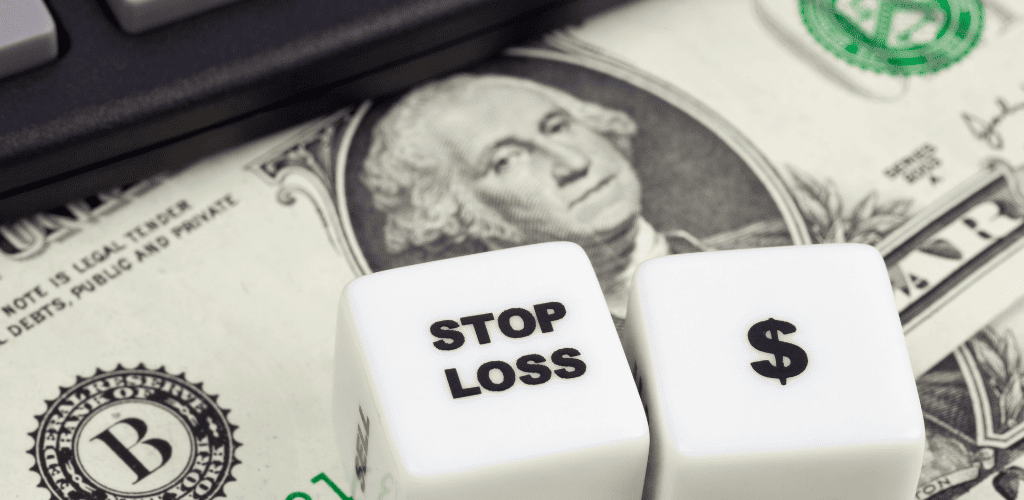 imagem que mostra um dado (objeto) com a palavra Stop loss
