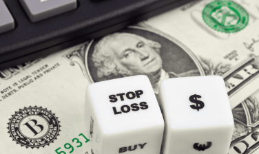 imagem que mostra um dado (objeto) com a palavra Stop loss